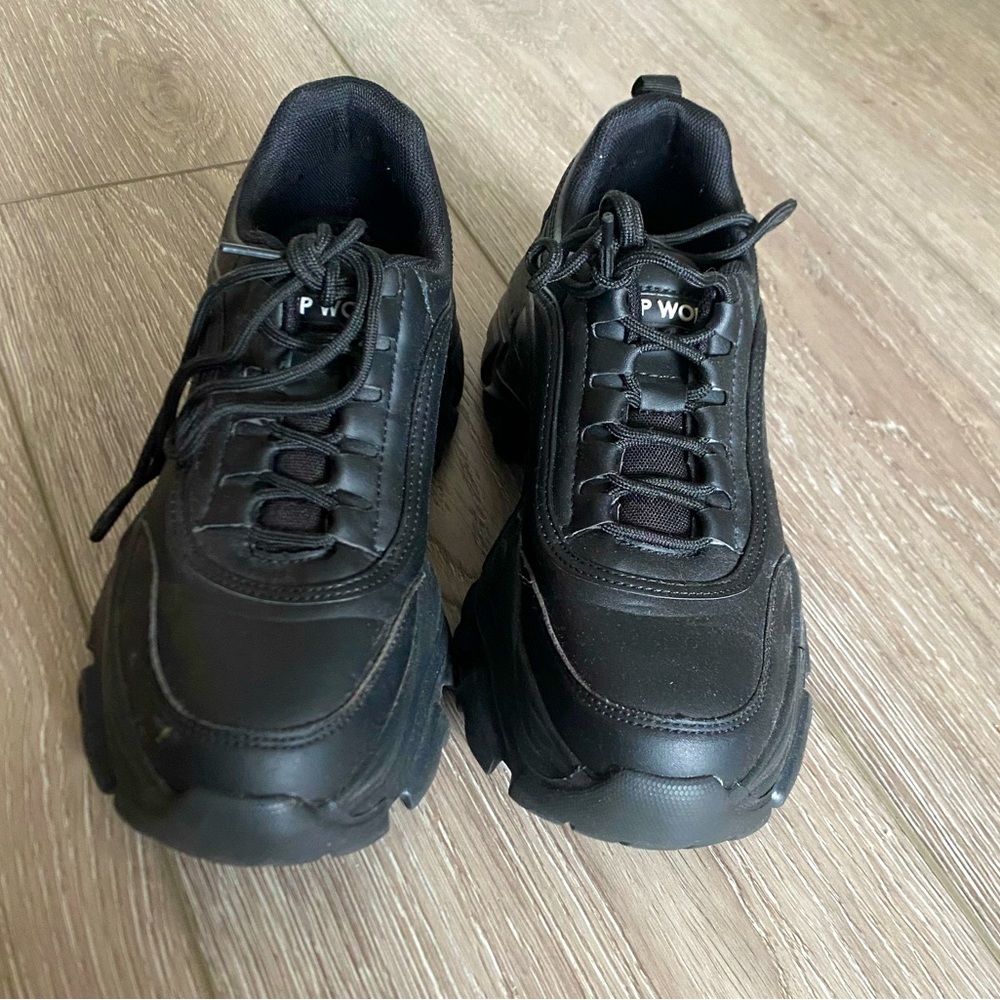 Black platformed shoes